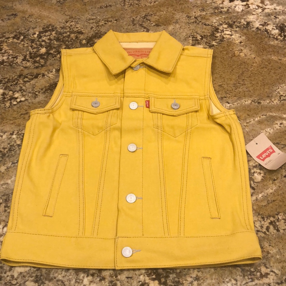 Yellow Levi Bad Ass sleeveless denim jacket.Score!